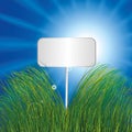 Blank sign in grass Royalty Free Stock Photo