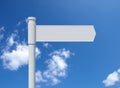 Blank signpost on a blue sky. Clouds. Isolated. Royalty Free Stock Photo