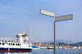 Blank signpost with clipping path at public marina bay