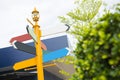 Blank signpost on colorful wooden