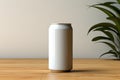 Blank Silver Soda Can Mockup on Wooden Kitchen Table. Royalty Free Stock Photo