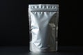 Blank silver stand up pouch with zipper closure on dark background Royalty Free Stock Photo