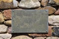 Blank Slate Sign on Stone Wall