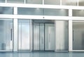 Blank sliding glass doors entrance mockup Royalty Free Stock Photo
