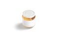 Blank small glass jar with label and honey mockup stand