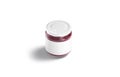 Blank small glass jar with white label and jam mockup