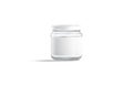 Blank small glass jar with white label mockup stand, isolated Royalty Free Stock Photo