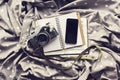 Blank smartphone screen with diary, old style photo camera and b Royalty Free Stock Photo