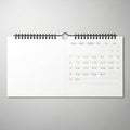 Blank spiral bound wall calendar open to a page with handwritten notes and an empty space for text isolated on white background Royalty Free Stock Photo