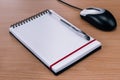 Blank Spiral Notebook, Pen and Computer Mouse Royalty Free Stock Photo