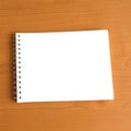 Blank Spiral Notebook on Wooden Surface Royalty Free Stock Photo