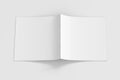 Blank square brochure or booklet cover mock up on white. Brochure is open and upside down. Isolated with clipping path around broc Royalty Free Stock Photo