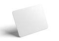 Blank square coaster casting a subtle shadow on a white surface Royalty Free Stock Photo