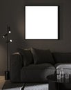 Blank square picture frame mock up in Modern room interior background with black wall and stylish black sofa and design coffee Royalty Free Stock Photo