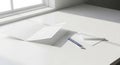 Blank Stationery Set on White Desk with Window Light Royalty Free Stock Photo