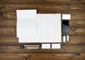 Blank stationery set on wooden background Royalty Free Stock Photo