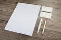 Blank Stationery on wooden background. Consist of Business cards Royalty Free Stock Photo