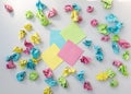 Blank sticky notes among a lot of crumbled notes paper