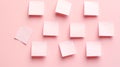 Blank sticky notes on a pink background