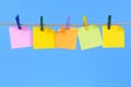 Row of blank post it sticky notes on a rope, copy space Royalty Free Stock Photo