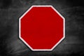 Blank stop sign on a black chalkboard Royalty Free Stock Photo