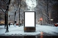 Blank street billboard in snowy city at night. Mockup Royalty Free Stock Photo