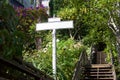 Blank street sign on secluded stairway