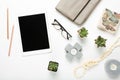 Blank tablet flat lay with desktop objects