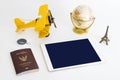 Blank tablet screen with travel objects on white background Royalty Free Stock Photo