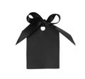 Blank tag with black satin ribbon tied in bow on white background, top view. Space for design Royalty Free Stock Photo