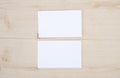 Blank template for branding identity of white business name card for mock up process on wooden table background Royalty Free Stock Photo