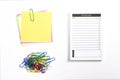 Blank to do list planner with checklist, colorful paper clips and note papers isolated on white background Royalty Free Stock Photo