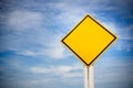 Blank on traffic sign on yellow background with cloudy blue sky. symbol for transportation regulations. image for background Royalty Free Stock Photo