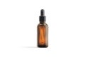 Blank transparent amber glass dropper bottle mockup, front view