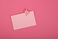 Blank Valentine paper card note on pink