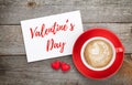 Blank valentines greeting card and red coffee cup