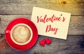 Blank valentines greeting card and red coffee cup