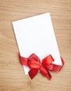 Blank valentines greeting card and red ribbon