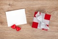 Blank valentines greeting card and small red gift box