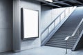 Empty billboard mockup near a staircase in a modern subway station. 3D Rendering