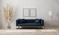 Blank vertical frames on gray decorative plaster wall in modern  living room interior with dark blue sofa, floor lamp, 3d Royalty Free Stock Photo