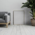 Blank vertical poster frame mock up standing on white wooden floor in light modern minimalist interior with white wall and grey Royalty Free Stock Photo