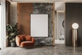 Blank vertical poster near orange armchair standing in front of concrete wall interior design Royalty Free Stock Photo