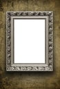 Blank vintage arrtframe on grunge wall Royalty Free Stock Photo