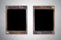 Blank vintage chalk boards on grunge cement wall