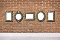 Blank vintage frames hanging on brick wall. Mockup for design Royalty Free Stock Photo