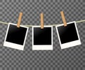 Blank Vintage Retro photo frames on the rope or clothespin on the transparent background - vector illustration. EPS 10. Royalty Free Stock Photo