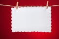 Blank vintage white paper over red background Royalty Free Stock Photo