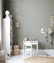 Blank wall mock up in cozy nursery interior background, Scandinavian style Royalty Free Stock Photo