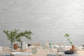 Blank wall mock up in the dinning room with served table Royalty Free Stock Photo